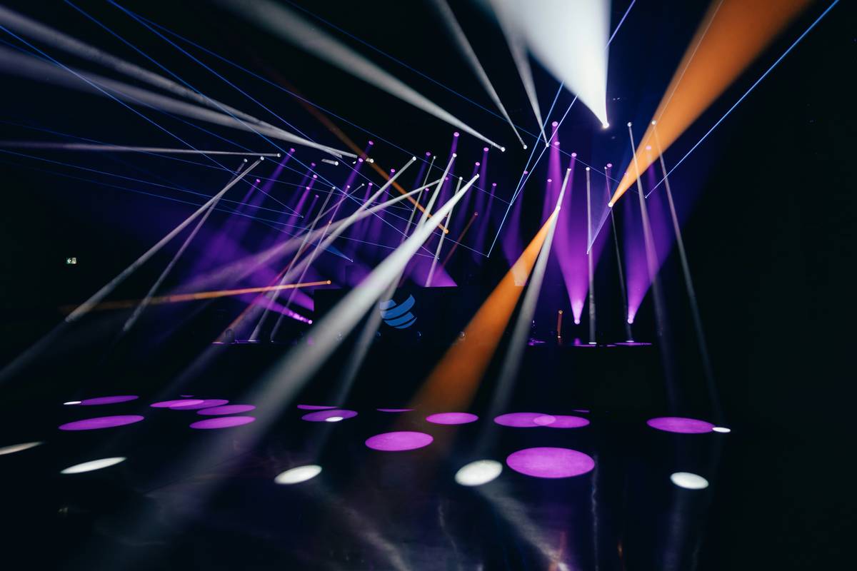 Streamer using professional streaming light shows with softbox and RGB accent lighting